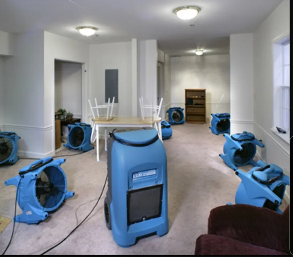 Air movers and dehumidifier setup for Water Damage Restoration in Cicero